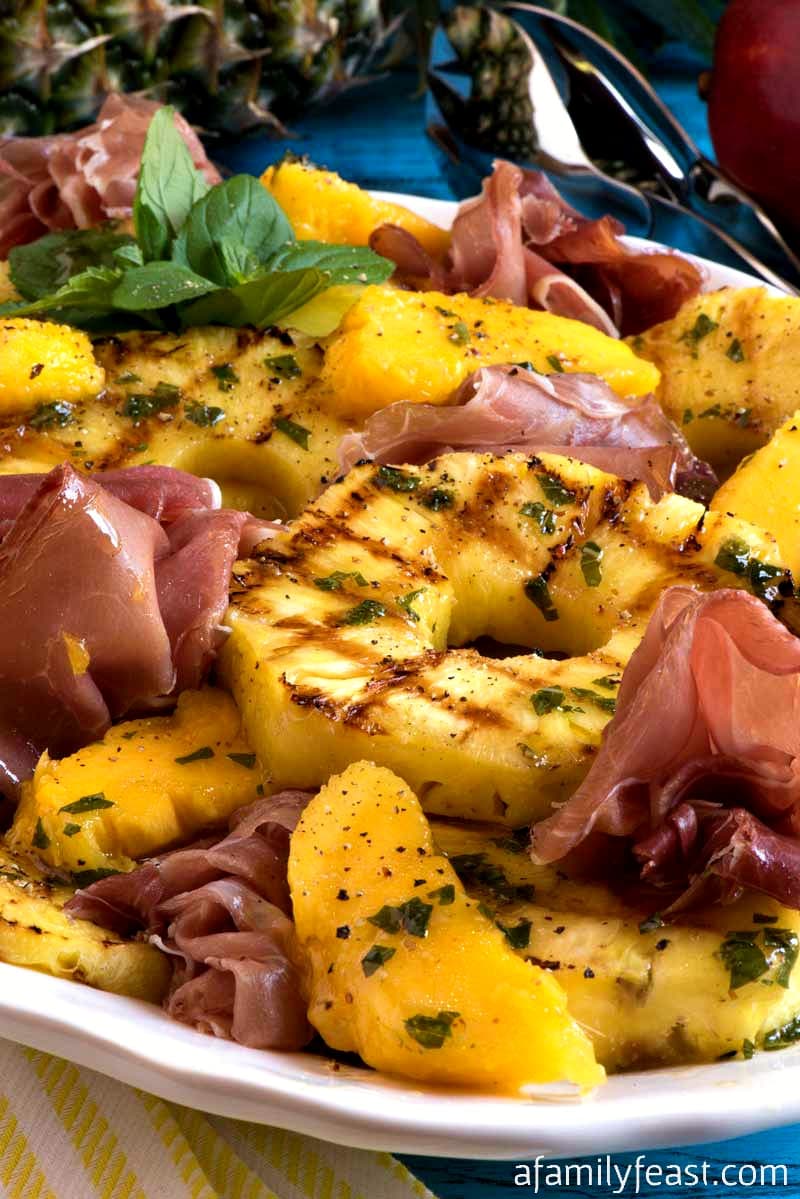 The sweet and savory flavors in this Grilled Tropical Fruit Salad with Prosciutto will have your taste buds dancing!