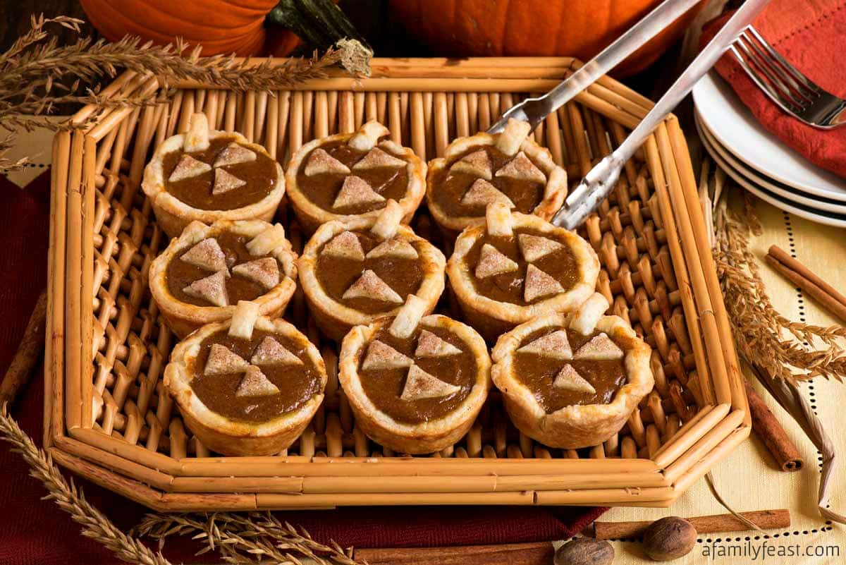 Mini Pumpkin Pies are the perfect, easy dessert for Halloween parties or your Fall holiday dessert tray!