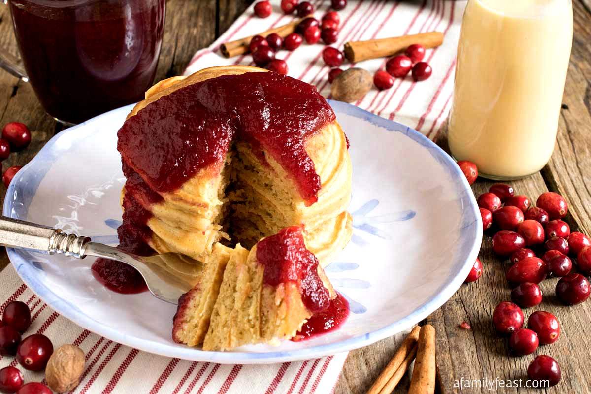 Eggnog Pancakes with Fresh Cranberry Syrup is a wonderful holiday breakfast the entire family will love!