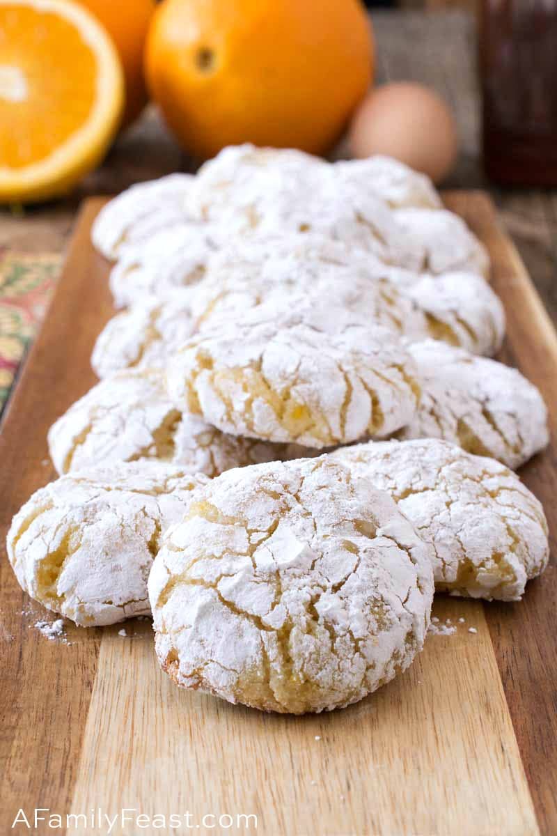 These Italian Almond-Orange Cookies are light and chewy with an intense, orange flavor. Coated in powdered sugar, the crinkled orange inside shows through after the cookies bake. Italian Almond-Orange Cookies