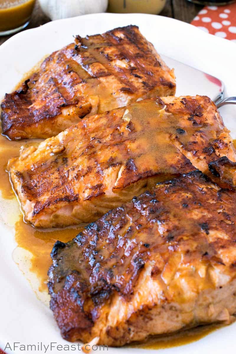 Asian Grilled Salmon recipe combines Dijon mustard, soy sauce, olive oil and garlic as a marinade and sauce that is perfect for fresh salmon. Asian Grilled Salmon