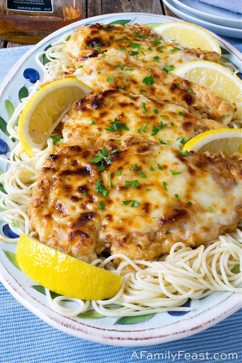 Chicken Exquisito has super tender breaded chicken topped with cheese, and served with sauce made from butter, brandy, and marsala wine. Chicken Exquisito