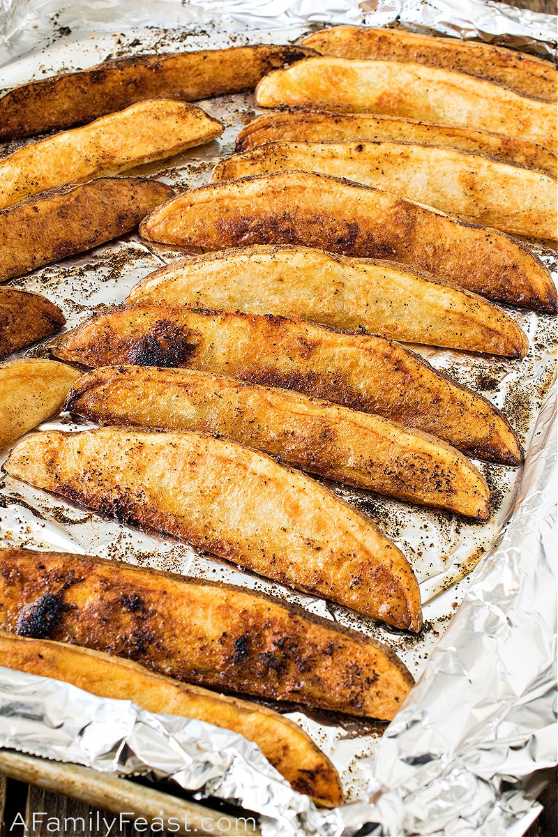 Crispy Oven-Roasted Potato Wedges on a baking sheet